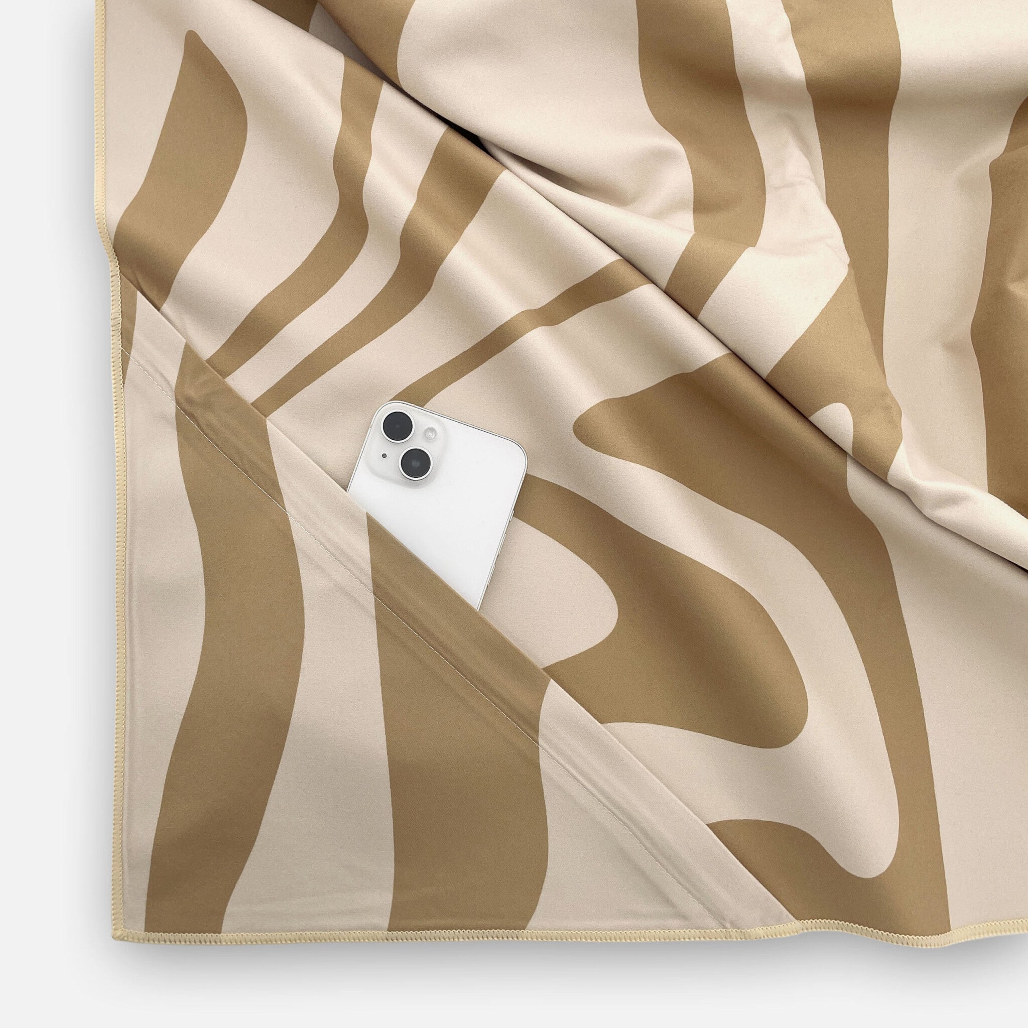 Strandlaken Sunset Swirl Zand 90x180